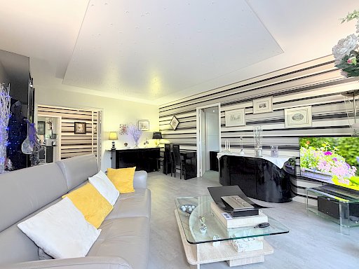 4 pièces traversant, jardin 26 m2 , DPE C, cave et parking