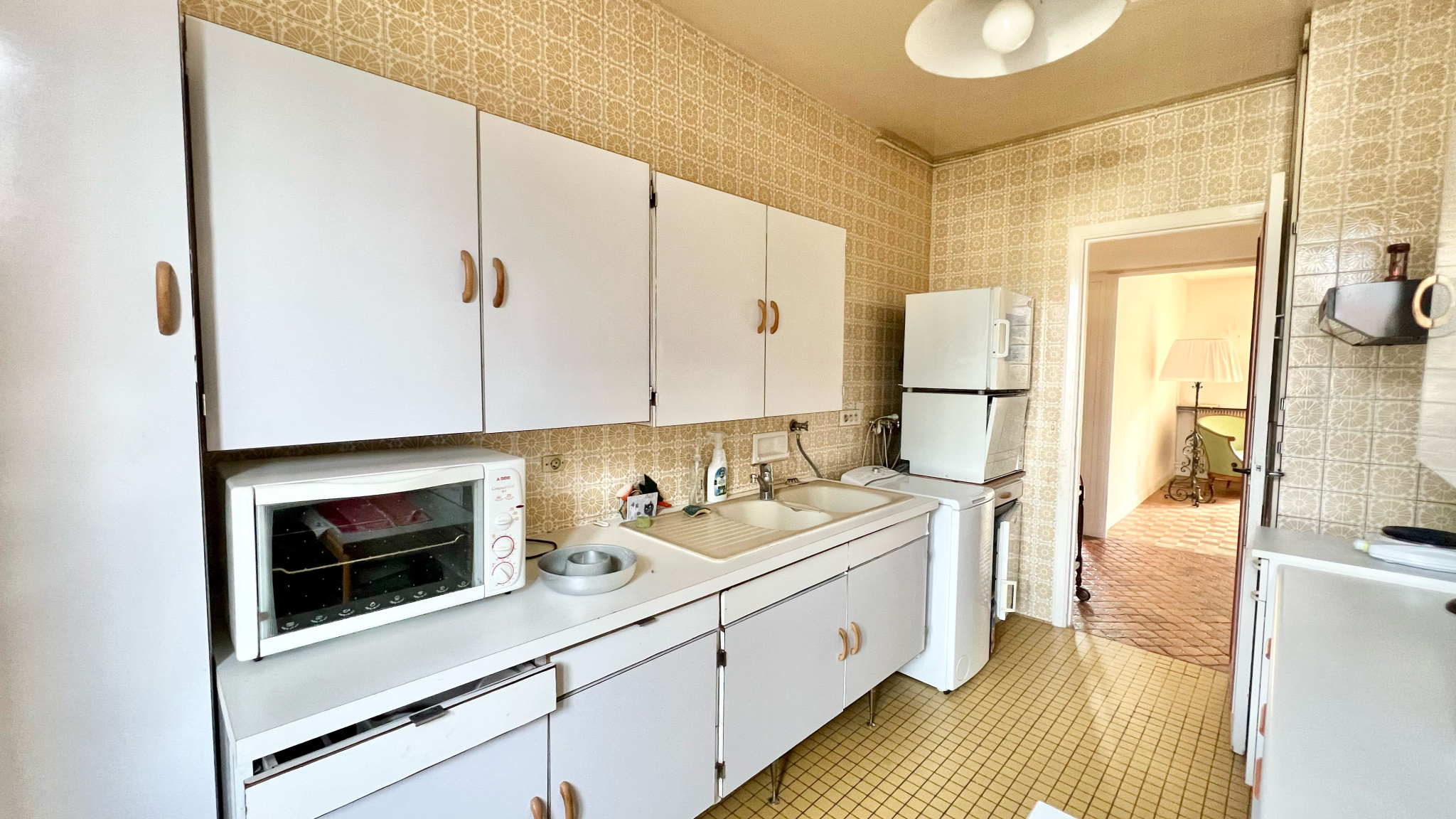 Appartement 3 pièces avec balcon et cheminée.