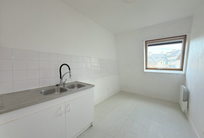 3 pièces avec parking, dernier étage, cœur de ville DPE C